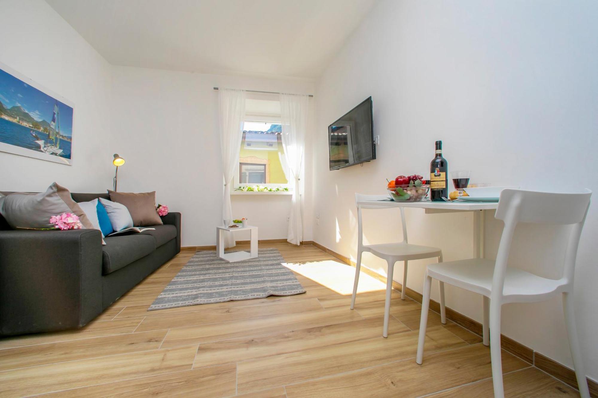 Nido Sui Tetti Di Riva Del Garda - Happy Rentals Exterior foto