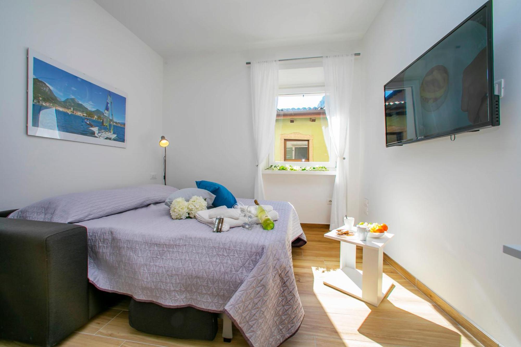 Nido Sui Tetti Di Riva Del Garda - Happy Rentals Exterior foto